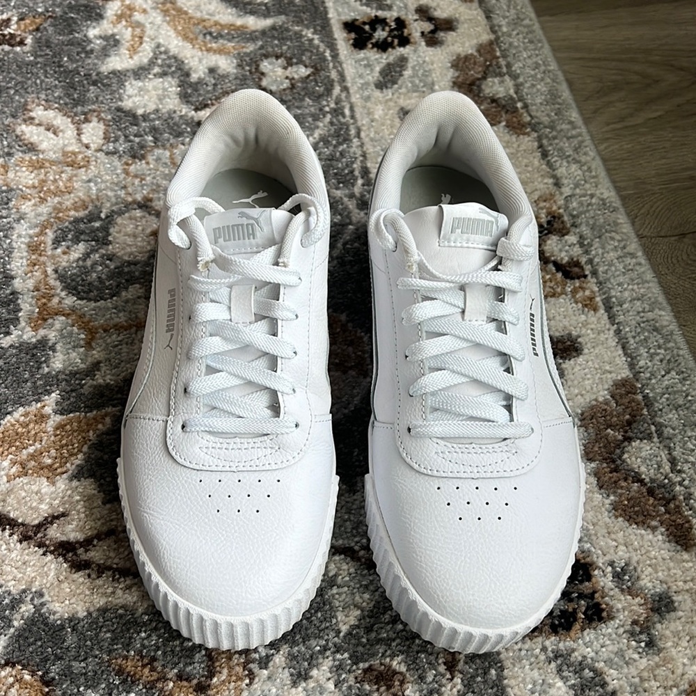 White on White Puma sneakers